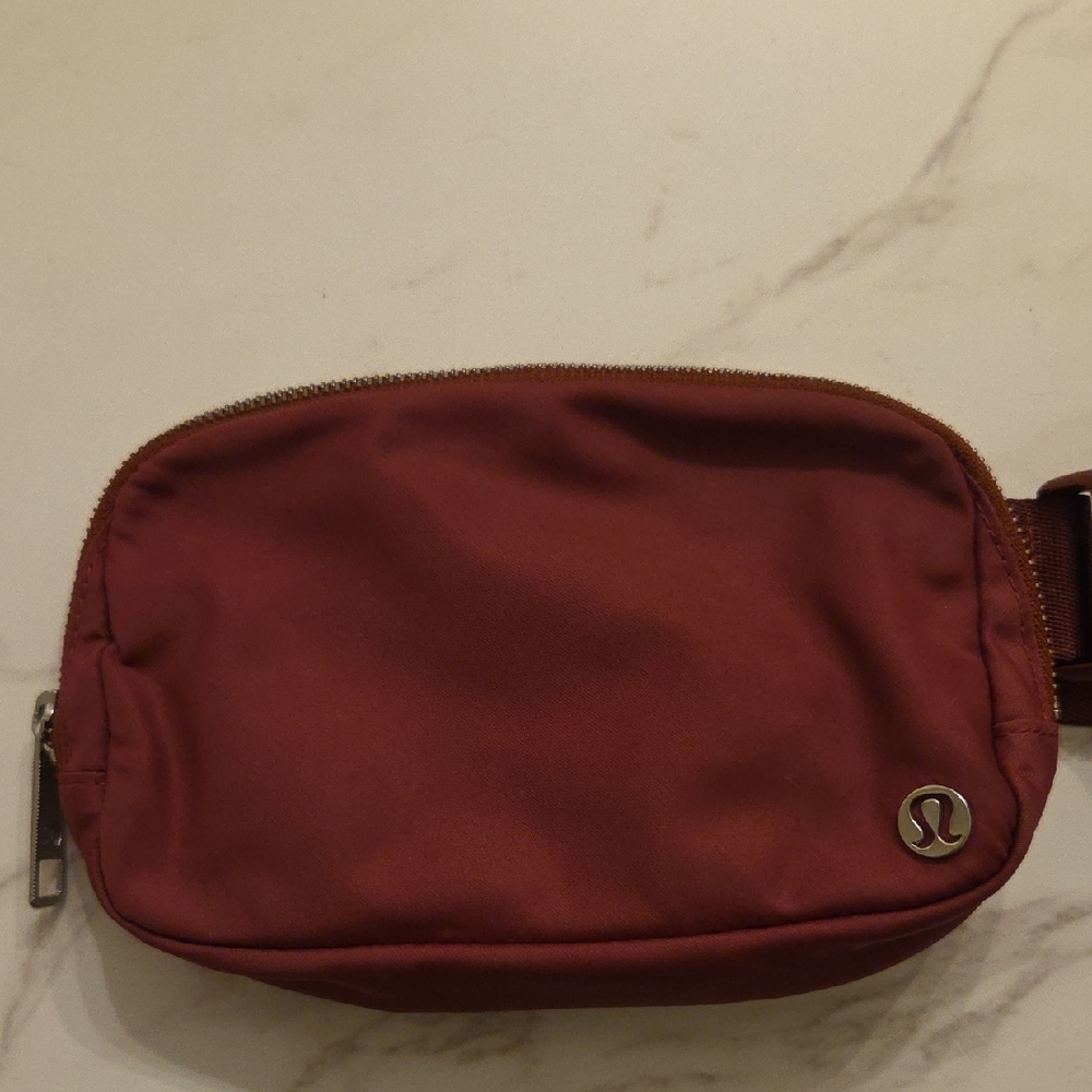 Lululemon Athletica Burgundy Belt Bag with Minimalist Design